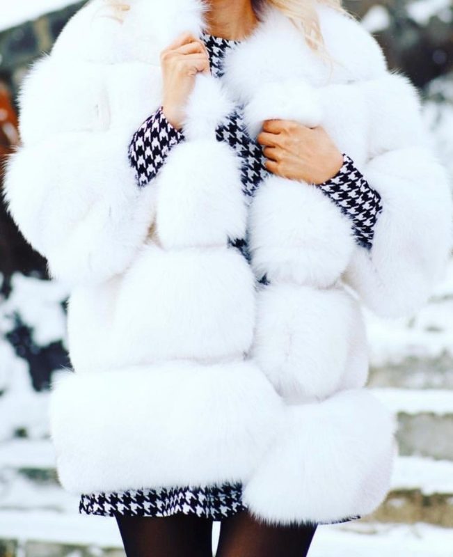 Girl in a white fur coat