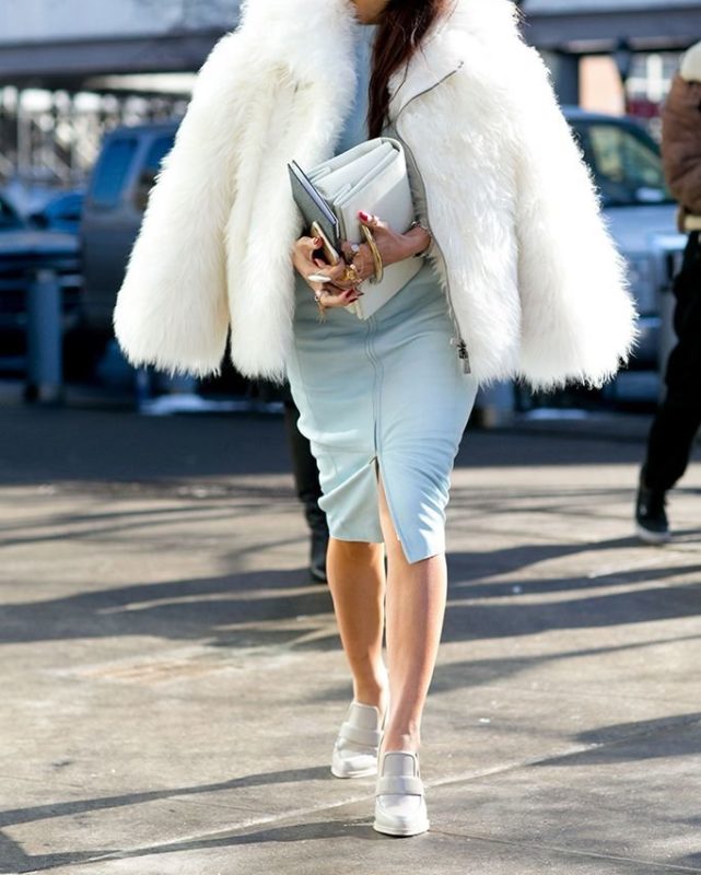 White fur coat and blue dress