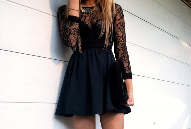 Black dress with a clutch