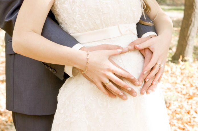 Wedding dress for pregnant bride