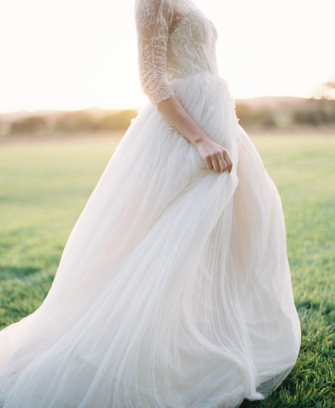 Pregnant in a magnificent wedding dress