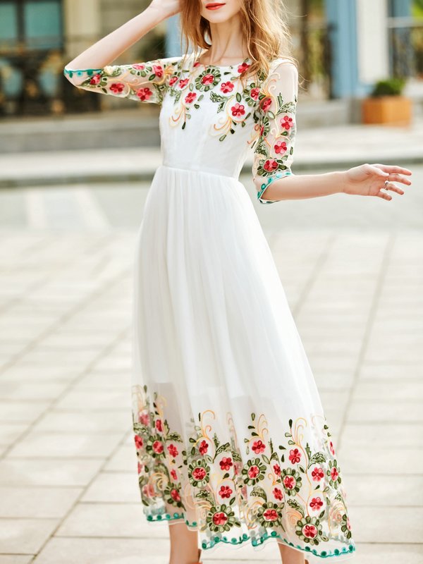 Dress with floral embroidery on a grid