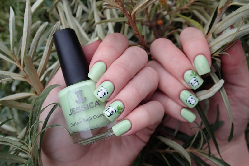 Gentle olive manicure with pandas.