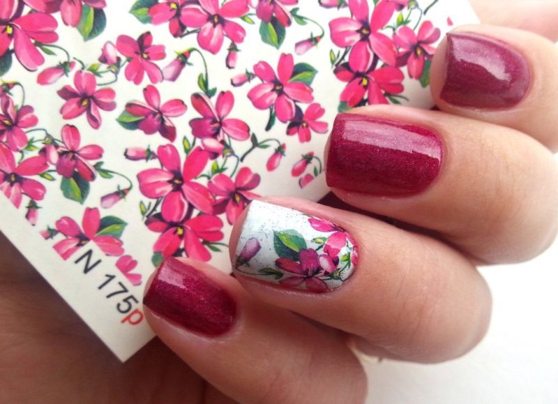 Wine gel polish combined with a flower slider