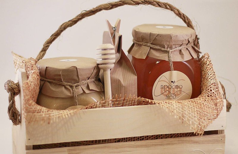 Wooden box with a set of honey