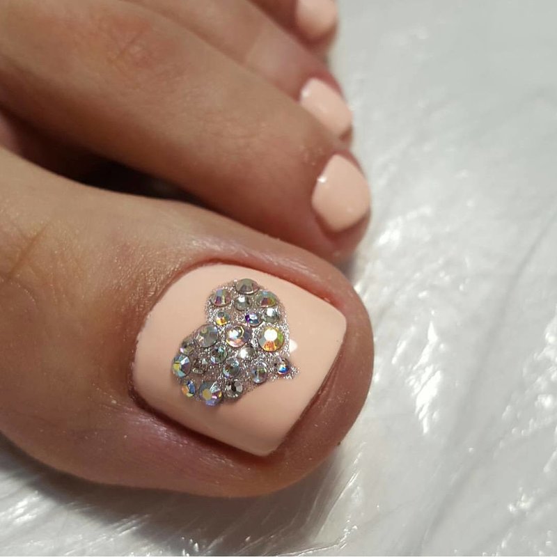 Heart pedicure with rhinestones