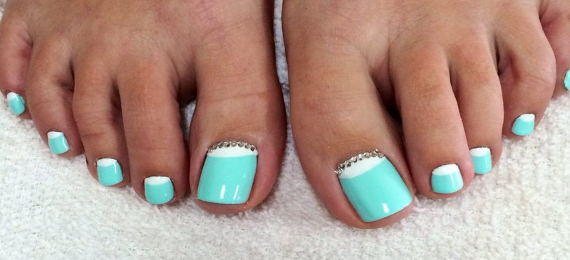 Lunar pedicure with rhinestones