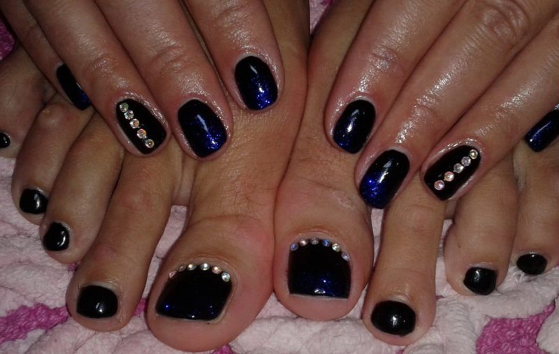 Black pedicure with rhinestones