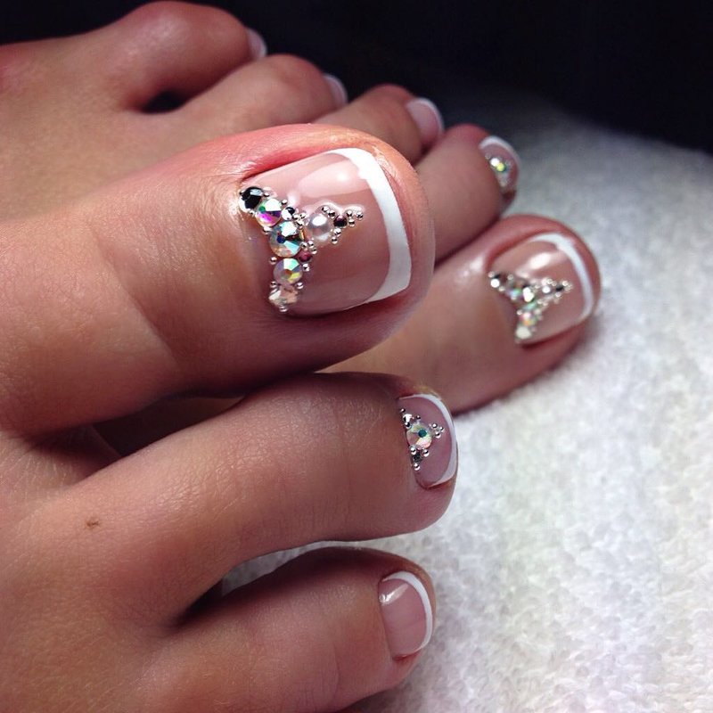 French with rhinestones at the hole on the feet