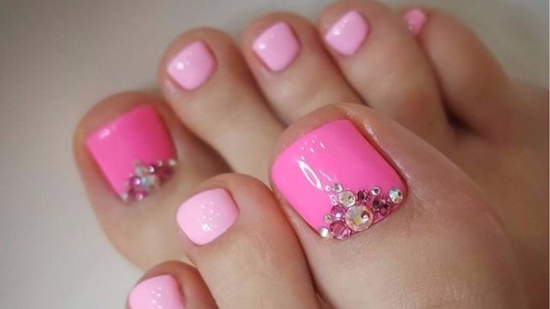 Pink pedicure with rhinestones