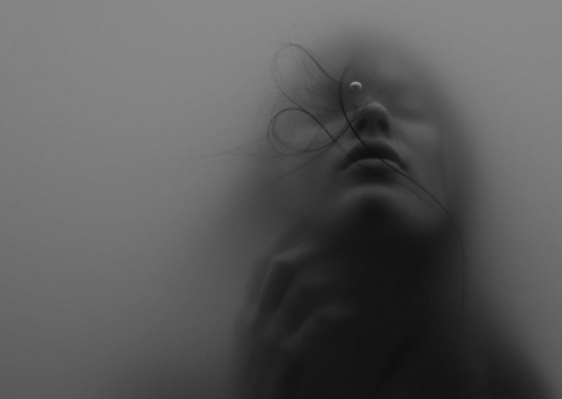 Woman in a fog in a dream