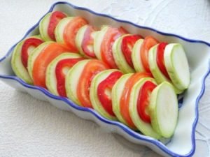 Zucchini casserole with tomato and cheese