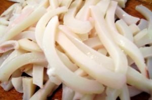 Winter squid salad with sauerkraut