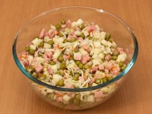 Salad with sauerkraut, ham and apple