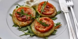 Zucchini with tomatoes in the oven