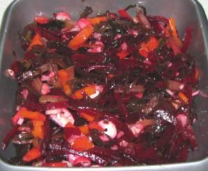 Vegetable salad with seaweed and crab sticks