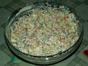 Salad with crab sticks, corn and fresh cucumber