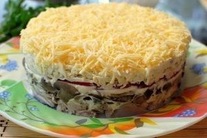 Royal salad with chicken and mushrooms