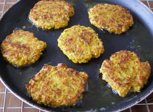 Zucchini fritters with cheese and garlic