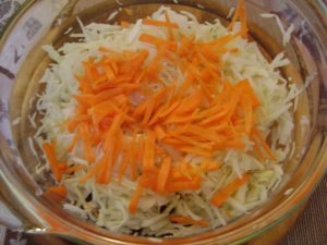 Vitamin salad of cabbage, carrots and Jerusalem artichoke