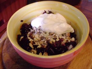 Beetroot salad with nuts, garlic and wheat seedlings