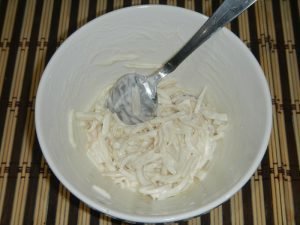 Salad with squid, crab sticks and red caviar