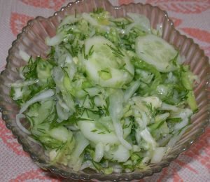 Young cabbage salad with cucumbers