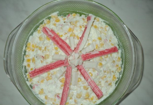 Salad crab sticks with apple and corn