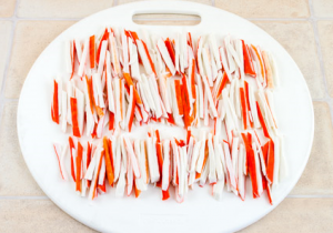 Salad with crab sticks and fresh cucumbers