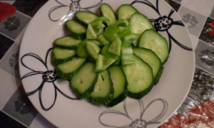 Vegetable salad with yellow tomatoes