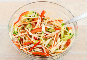 Salad with crab sticks and fresh cucumbers