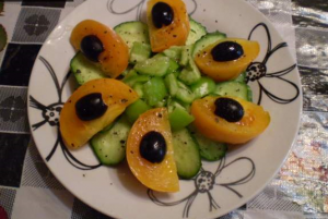 Vegetable salad with yellow tomatoes