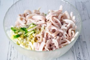 Salad with squid, egg and cucumbers