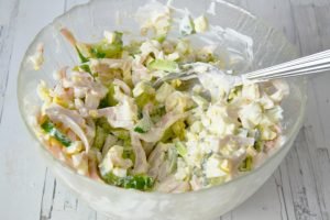 Salad with squid, egg and cucumbers