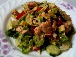 Salad with celery, tuna, cucumber and pepper