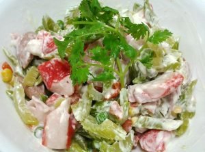 Salad with celery and crab sticks