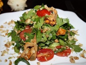 Salad with celery, wild mushrooms and tomatoes