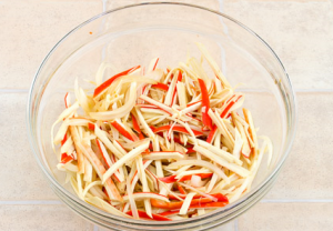 Salad with crab sticks and fresh cucumbers