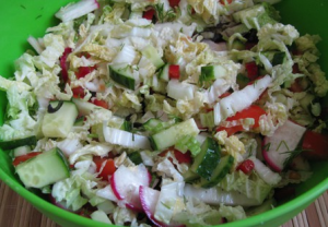 Salad with radish, Beijing cabbage, cucumber and tomato