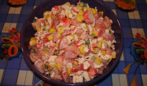 Salad with crab sticks, tomatoes and ketchup