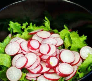 Salad with radish, fresh cucumber and egg