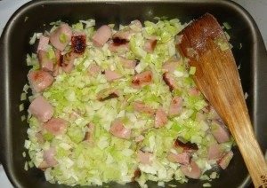 Bulk pie with cabbage and sausages