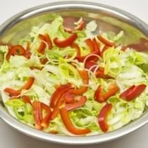 Vegetable salad with lemon and onion dressing