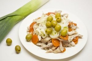 Holiday salad with chicken, feta cheese and hollandaise sauce