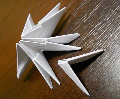 How to make a swan out of paper: in stages