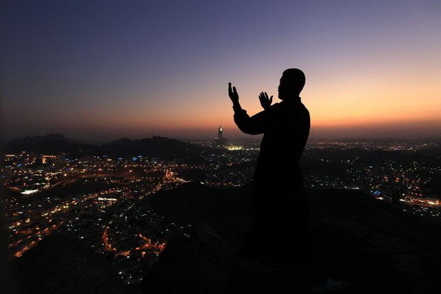 Muslim reads evening prayer