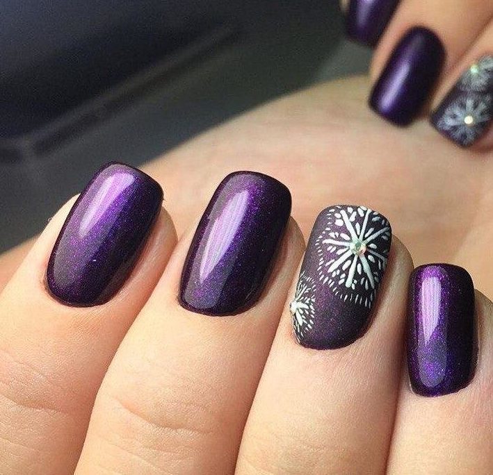 Purple snowflake manicure