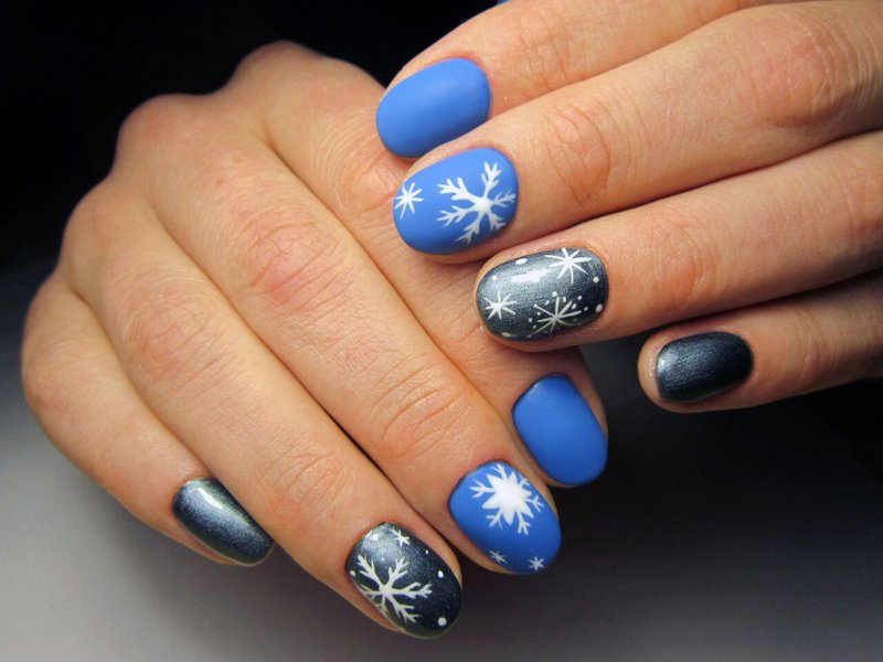 Winter manicure with snowflakes