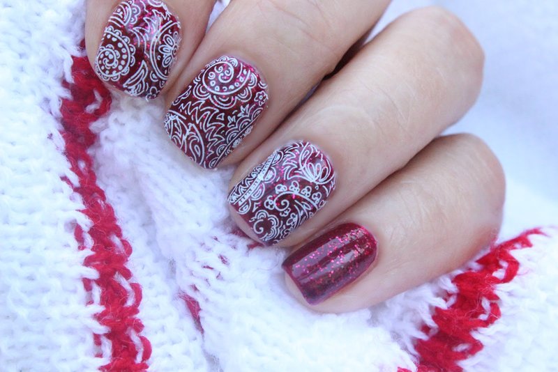 White lace on red nails with glitter