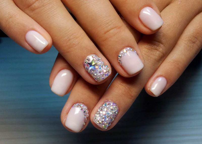 Wedding manicure nude with a hole and rhinestones